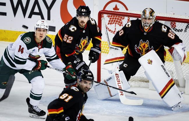Minnesota Wild keep winning after coaching change, douse Flames 5-2 | iNFOnews.ca