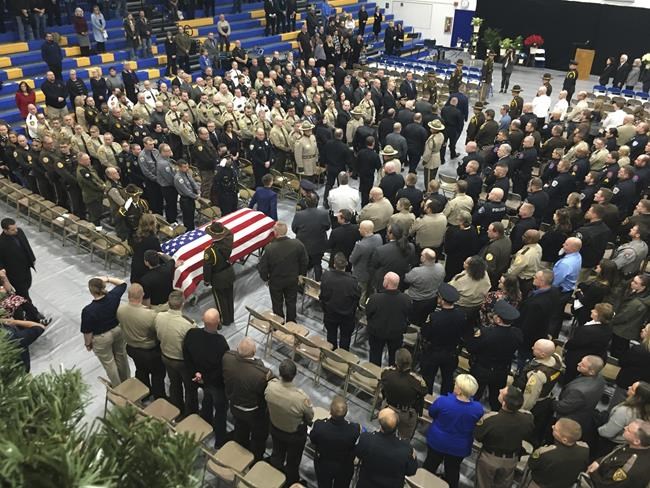 Funeral and procession honors North Dakota sheriff's deputy killed in crash involving senator's son | iNFOnews.ca