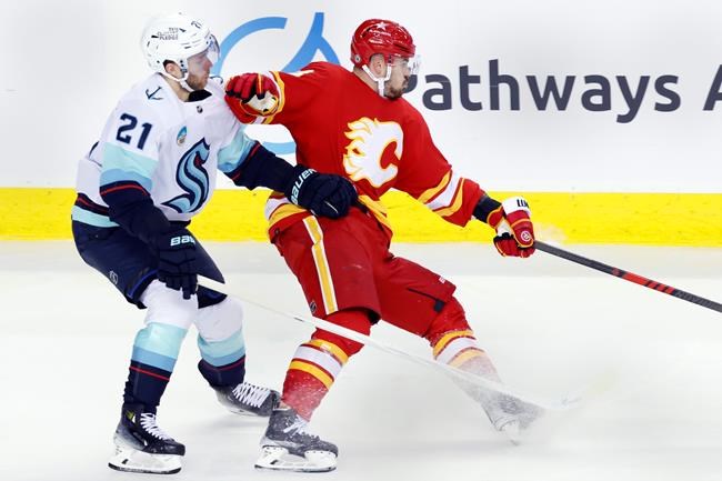 'Pretty emotional': Driedger makes 37 saves in NHL return, Kraken hold off Flames 2-1 | iNFOnews.ca