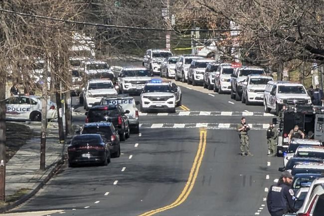 3 officers shot in Washington, leading to daylong standoff before suspect's arrest | iNFOnews.ca 3 officers shot in Washington, leading to daylong standoff before suspect's arrest | iNFOnews.ca