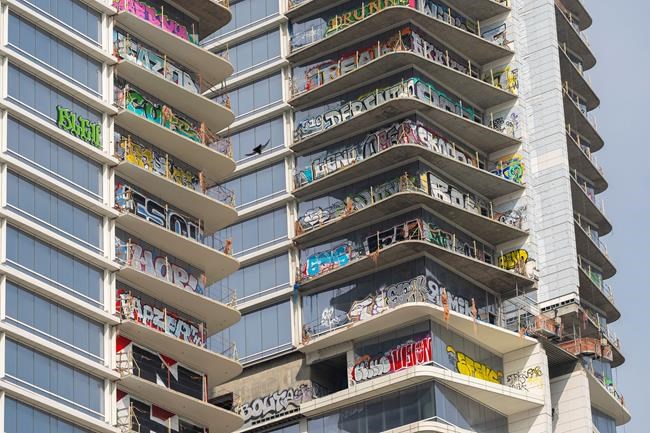Crews take steps to secure graffiti-scarred Los Angeles towers left unfinished by developer | iNFOnews.ca Crews take steps to secure graffiti-scarred Los Angeles towers left unfinished by developer | iNFOnews.ca