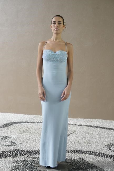 Armani offers hope for a better season with winter flowers as he closes Milan Fashion Week | iNFOnews.ca