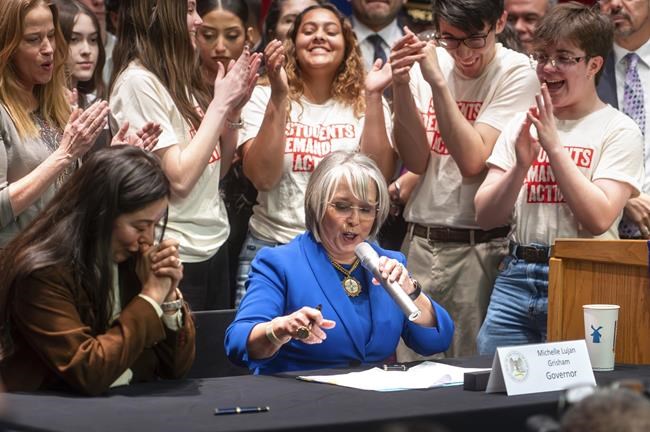 New Mexico governor signs bill that bans some guns at polls and extends waiting period to 7 days | iNFOnews.ca