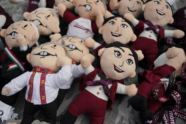 Hats, T-shirts and dolls reflect outgoing Mexican president's outsized presence in upcoming election | iNFOnews.ca