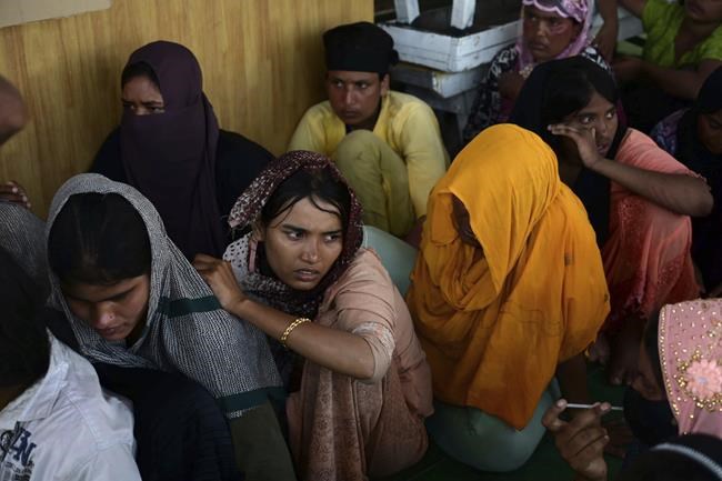 Weeping, weak and soaked, dozens of Rohingya refugees rescued after night on hull of capsized boat | iNFOnews.ca Weeping, weak and soaked, dozens of Rohingya refugees rescued after night on hull of capsized boat | iNFOnews.ca