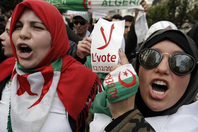 Algerians question president for calling an early election without announcing his own campaign | iNFOnews.ca