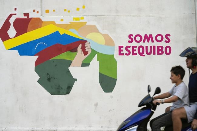 Guyana condemns Venezuela for signing into law a referendum approving annexation of disputed region | iNFOnews.ca