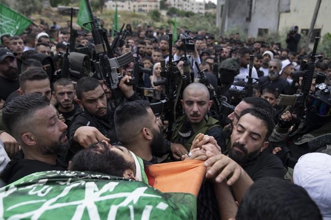 A Palestinian is killed as Israeli settlers rampage in his village and troops fire on stone-throwers | iNFOnews.ca A Palestinian is killed as Israeli settlers rampage in his village and troops fire on stone-throwers | iNFOnews.ca