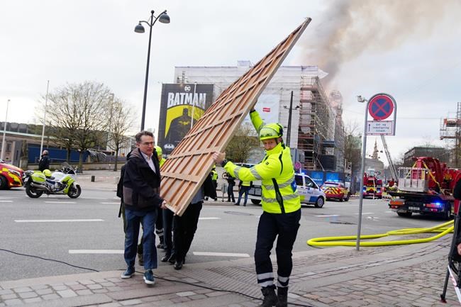 Fire destroys Copenhagen's Old Stock Exchange dating to 1600s, collapsing its dragon-tail spire | iNFOnews.ca Fire destroys Copenhagen's Old Stock Exchange dating to 1600s, collapsing its dragon-tail spire | iNFOnews.ca