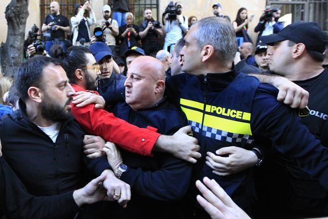 Georgian police fire tear gas to break up protest against so-called 'Russian law' | iNFOnews.ca