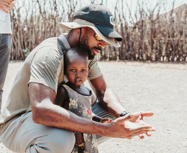 Edmonton Elks receiver Eugene Lewis says mission to Africa changed his life | iNFOnews.ca