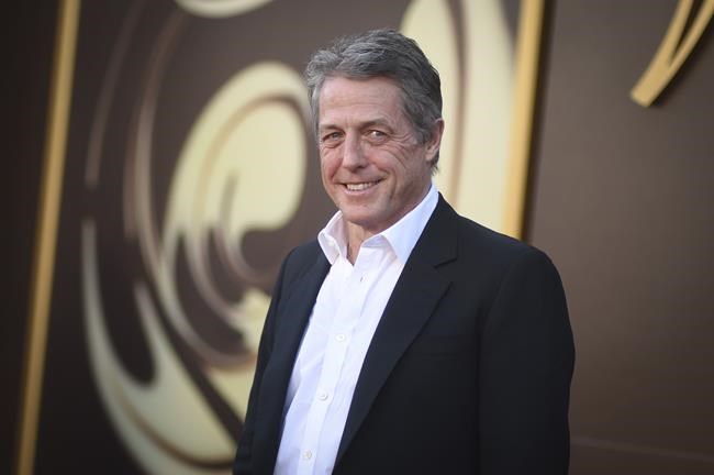Hugh Grant says he took 'enormous sum' to settle suit alleging illegal snooping by The Sun tabloid | iNFOnews.ca