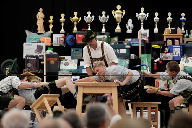 German men with the strongest fingers compete in Bavaria's 'Fingerhakeln' wrestling championship | iNFOnews.ca