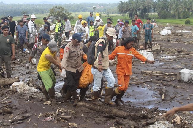 More bodies found in Indonesia after flash floods killed dozens and submerged homes | iNFOnews.ca More bodies found in Indonesia after flash floods killed dozens and submerged homes | iNFOnews.ca