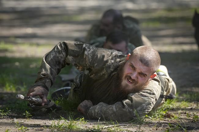 Ukraine's divisive mobilization law comes into force as a new Russian push strains front-line troops | iNFOnews.ca