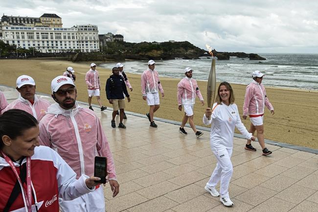 Man is held in France over posts about California murders as Olympic torch passes through Bordeaux | iNFOnews.ca