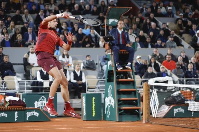 Novak Djokovic keeps his French Open title defense going by getting past Lorenzo Musetti in 5 sets | iNFOnews.ca