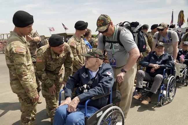 French children hail D-Day veterans as heroes as they arrive in Normandy for anniversary events | iNFOnews.ca