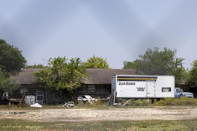 Seven charged in smuggling migrants in sweltering secret compartment with little water | iNFOnews.ca