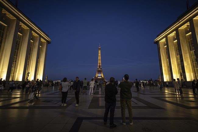 The Olympic rings are mounted on the Eiffel Tower to mark 50 days until the Paris Games | iNFOnews.ca
