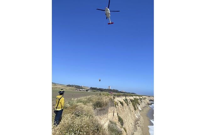 Kite surfer rescued from remote California beach after making 'HELP' sign with rocks | iNFOnews.ca