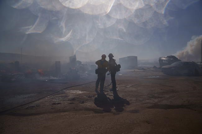 California firefighters gain ground against big wildfires after hot, windy weekend | iNFOnews.ca California firefighters gain ground against big wildfires after hot, windy weekend | iNFOnews.ca