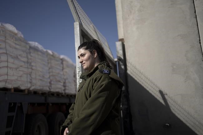 Israel's pledge to guard an aid route into Gaza falls flat as lawlessness blocks distribution | iNFOnews.ca Israel's pledge to guard an aid route into Gaza falls flat as lawlessness blocks distribution | iNFOnews.ca