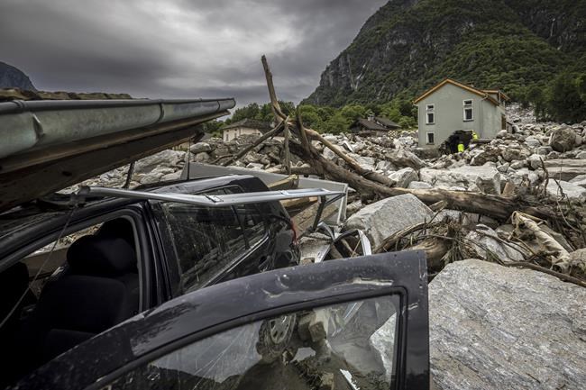 1 person found dead and 2 still missing after floods, rockslide hit a Swiss Alpine village | iNFOnews.ca