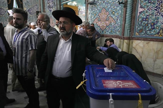 Polls close in Iran presidential election held after hard-liner's death and as Mideast tensions rise | iNFOnews.ca Polls close in Iran presidential election held after hard-liner's death and as Mideast tensions rise | iNFOnews.ca