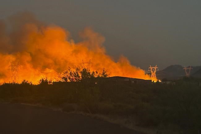 Evacuation orders lifted for some Arizona residents forced from their homes days ago by a wildfire | iNFOnews.ca