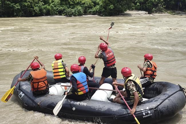 Nepal authorities say 65 people were on board the buses missing in a river since Friday | iNFOnews.ca