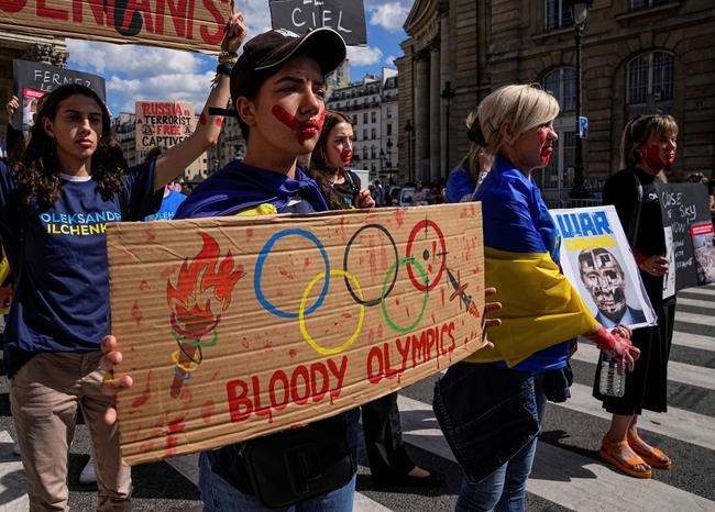 Peaceful pre-Olympic protest in Paris honors fallen Ukrainian athletes | iNFOnews.ca Peaceful pre-Olympic protest in Paris honors fallen Ukrainian athletes | iNFOnews.ca