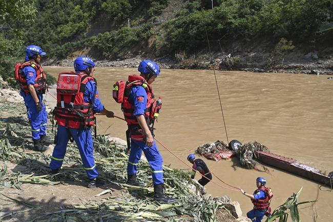 Rescuers search for dozens missing after flooding and a bridge collapse in China kill at least 25 | iNFOnews.ca Rescuers search for dozens missing after flooding and a bridge collapse in China kill at least 25 | iNFOnews.ca