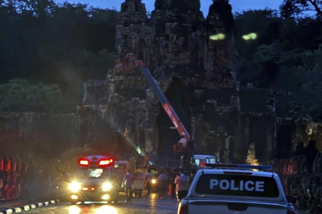 Fierce storm topples tree at Cambodian Angkor temple complex, killing 1 and damaging statues | iNFOnews.ca Fierce storm topples tree at Cambodian Angkor temple complex, killing 1 and damaging statues | iNFOnews.ca