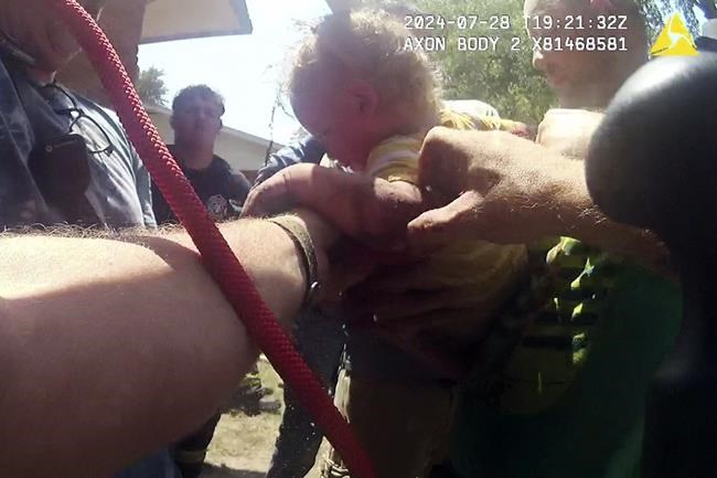 14-month-old boy rescued after falling down narrow pipe in the yard of his Kansas home | iNFOnews.ca 14-month-old boy rescued after falling down narrow pipe in the yard of his Kansas home | iNFOnews.ca