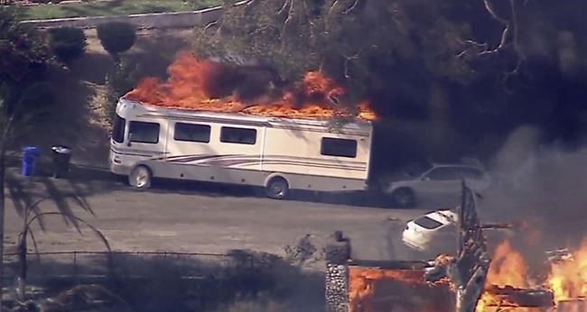 Fast-moving Southern California wildfire torches hillside homes, forcing evacuations | iNFOnews.ca Fast-moving Southern California wildfire torches hillside homes, forcing evacuations | iNFOnews.ca