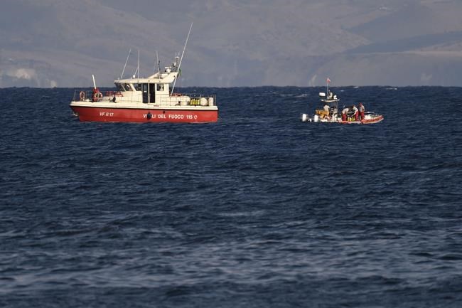 Rescue crews unload body bag in Sicily port as search continues after yacht sinking | iNFOnews.ca