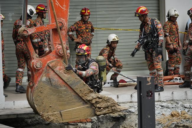 Woman from India disappears down a sinkhole in Malaysia's capital | iNFOnews.ca Woman from India disappears down a sinkhole in Malaysia's capital | iNFOnews.ca