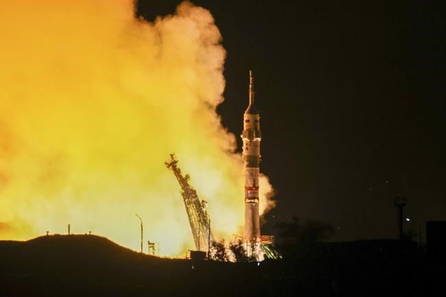 A Soyuz craft with 2 Russians and 1 American docks at the International Space Station | iNFOnews.ca A Soyuz craft with 2 Russians and 1 American docks at the International Space Station | iNFOnews.ca