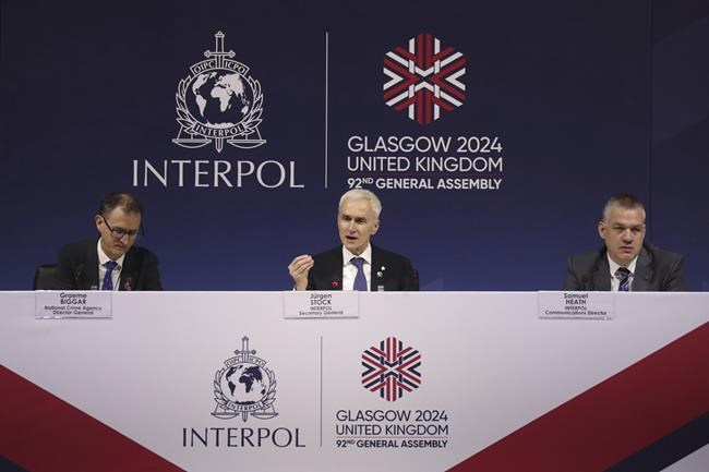 UK leader tells Interpol meeting world must 'wake up' to threat from people-smugglers | iNFOnews.ca