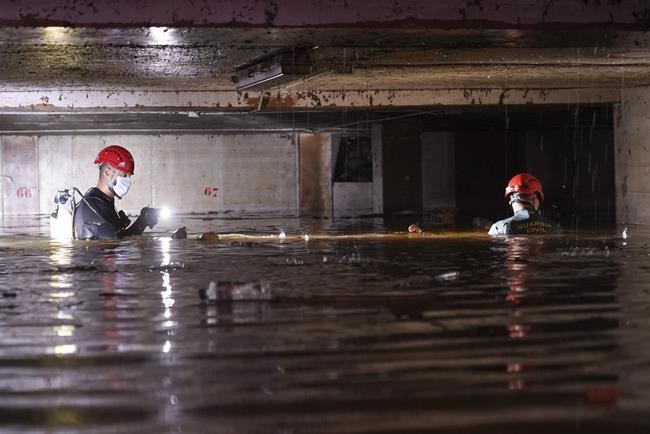 Heavy rains in Barcelona disrupt rail service as troops search for more flood victims in Valencia | iNFOnews.ca