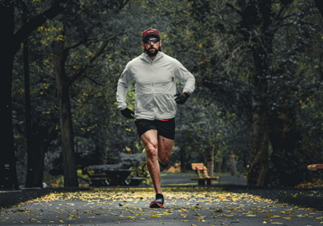 From Kamloops to the Sahara: Endurance runner's all-out effort to raise $250K for cancer | iNFOnews.ca A man runs toward the camera in a park.