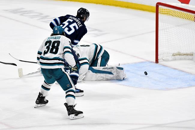 Jets rally to beat Sharks 2-1 in OT, extend win streak to 10 straight | iNFOnews.ca Jets rally to beat Sharks 2-1 in OT, extend win streak to 10 straight | iNFOnews.ca