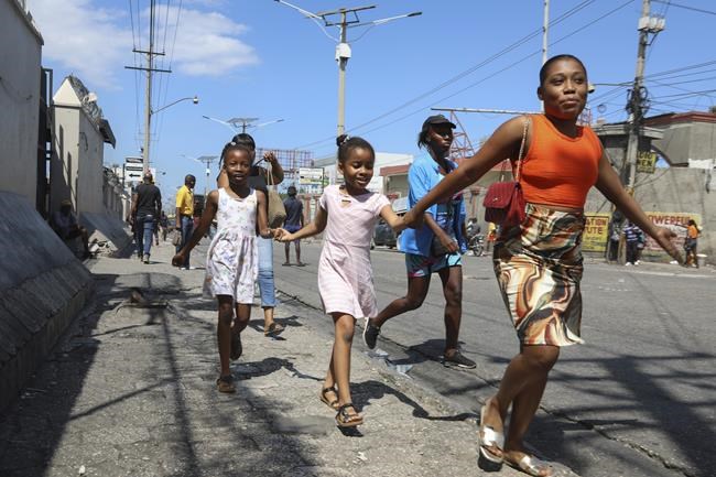 Gangs launch a new and deadly attack on Haiti's capital as dozens flee | iNFOnews.ca