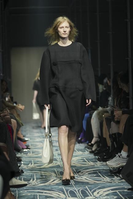Prada reconstructs femininity starting with the little black dress fit to dark times | iNFOnews.ca