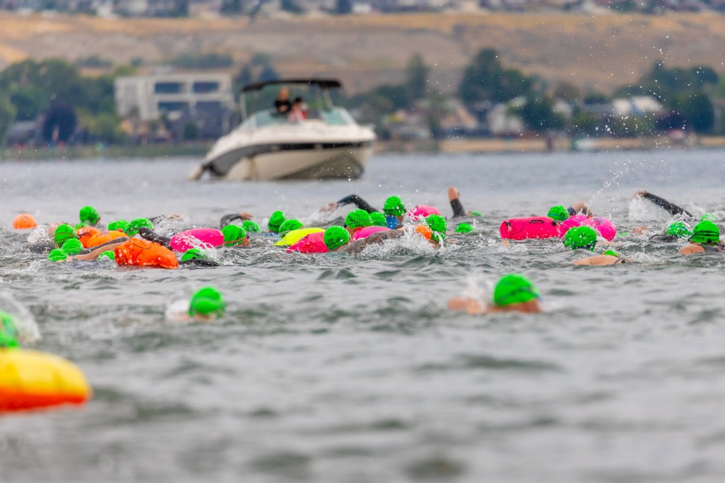 Swimmers prepare to cross Okanagan Lake in longstanding Kelowna tradition | iNFOnews.ca Swimmers crossing Okanagan Lake during the 2025 Kelowna Across the Lake Swim