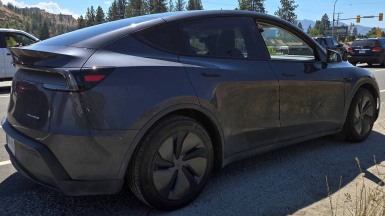 Tesla driver caught reading in traffic ticketed in West Kelowna | iNFOnews.ca
