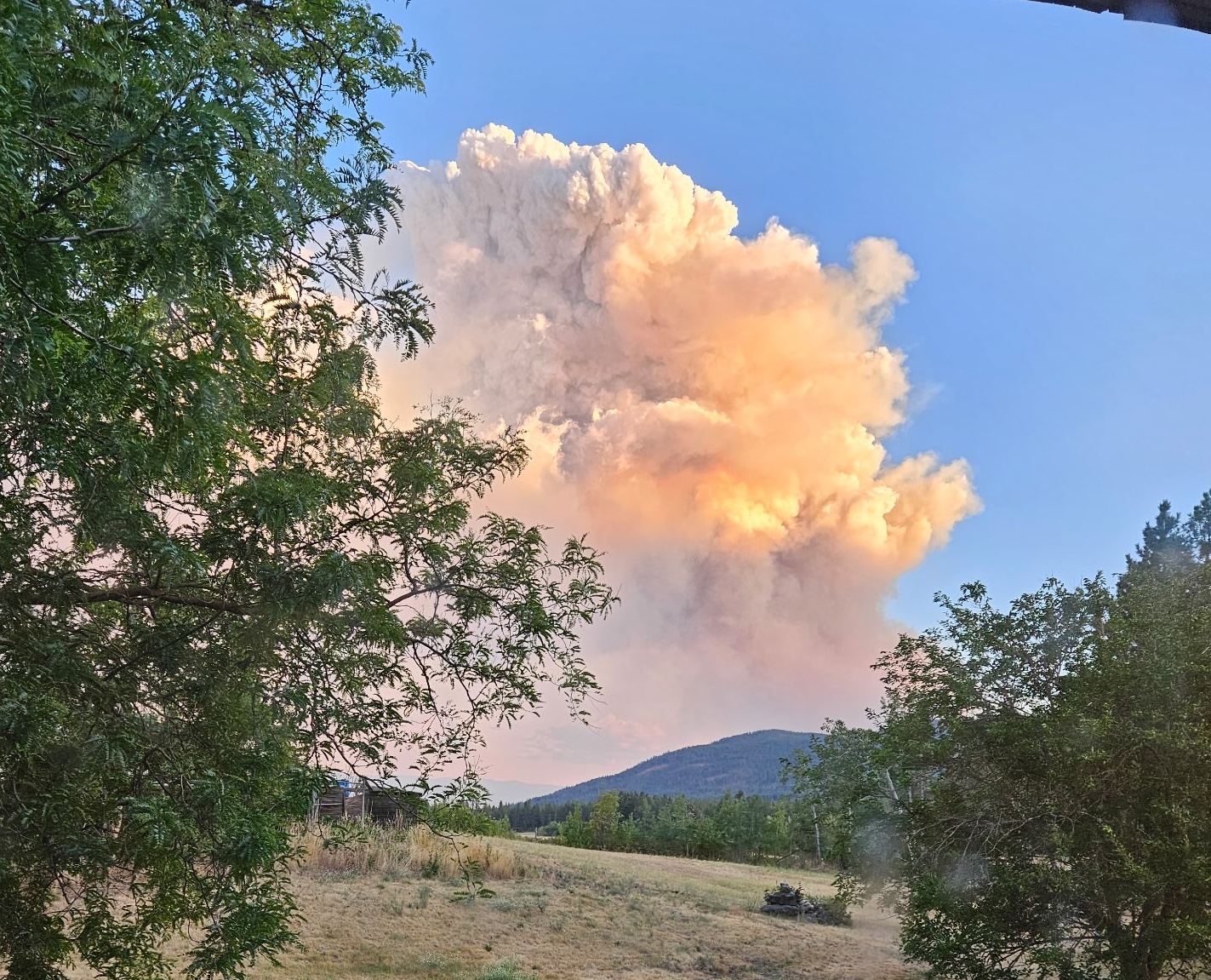 Smoke from a wildfire on the horizon.
