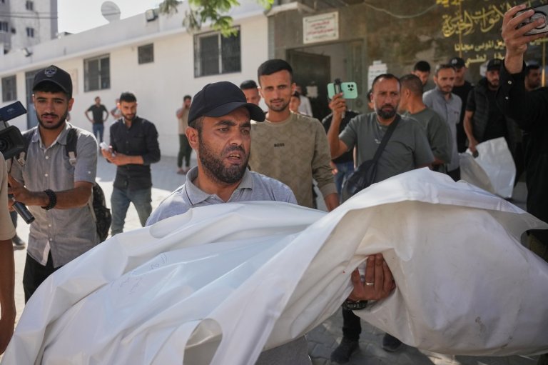 An Israeli strike hits a Gaza City apartment, killing 2 children, Palestinian health officials say | iNFOnews.ca