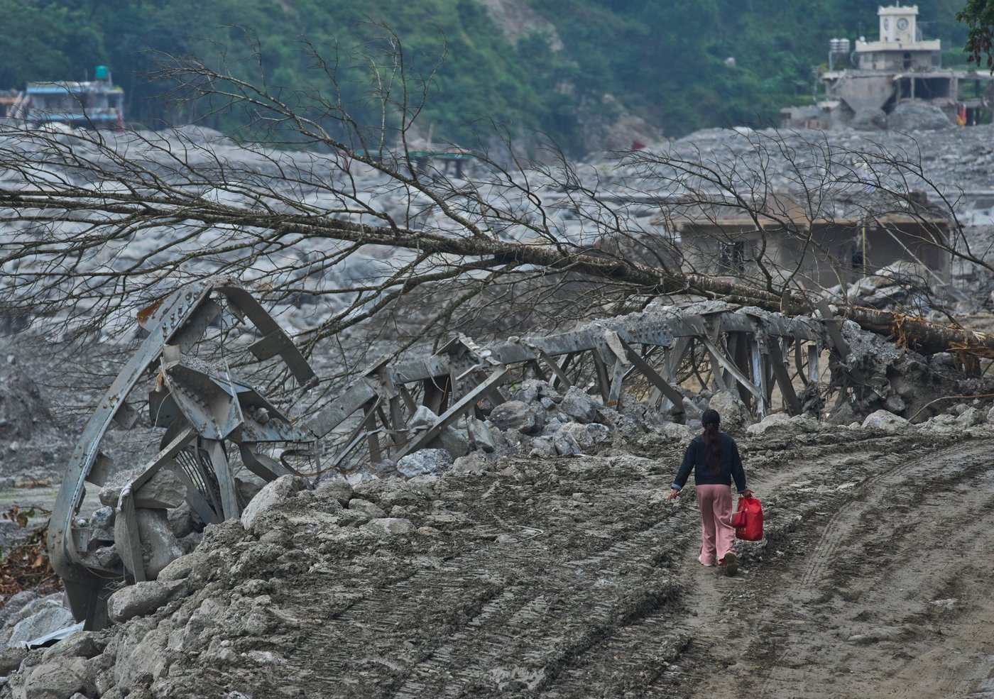 A month after Nepal floods, thousands are still missing and families face a long recovery | iNFOnews.ca